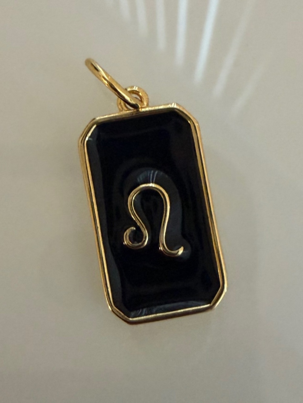 Black & Gold Leo Zodiac Pendant